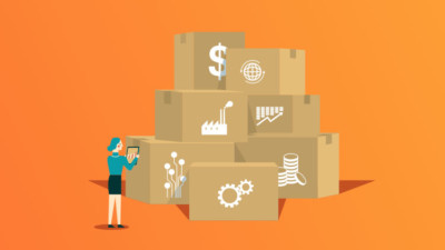 Employee checking assets in a bunch of boxes smaller