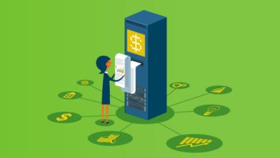 Woman checking business finances from ATM machine