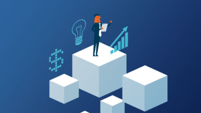 Man on cubes checking business data for success smaller