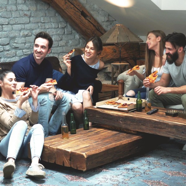 friends on a sofa having fun