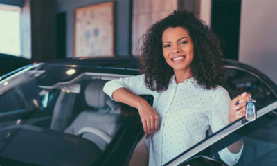 Image of someone with the keys to a new car.