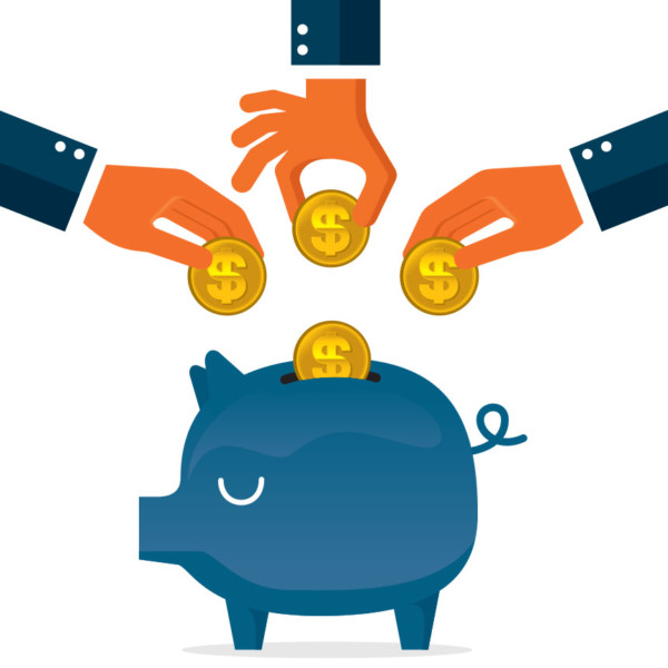 Image of hands putting coins in a piggy bank.