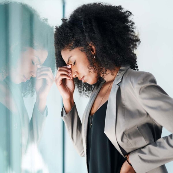 women stressed by a window