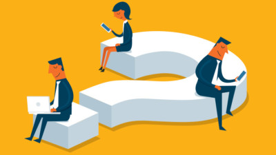 Image of three people sitting on a large question mark.