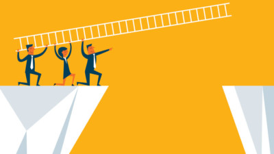 Image of three people using a ladder to bridge a gap between two structures.