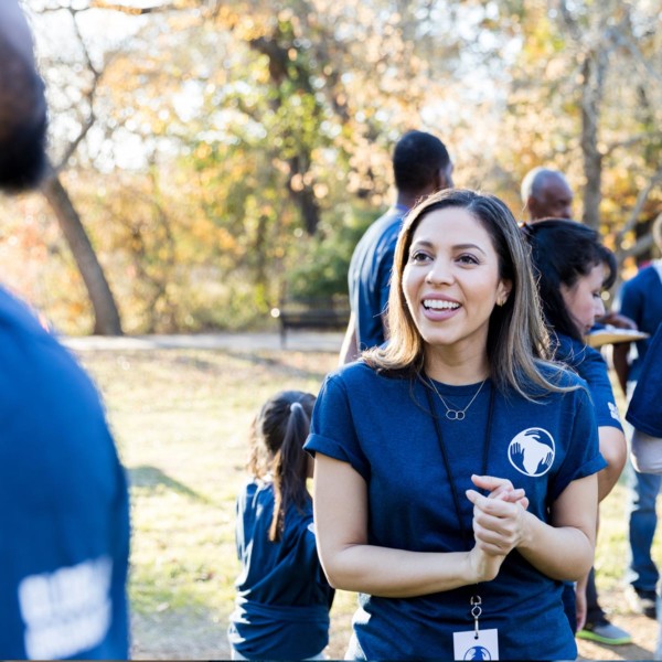 women welcoming people to a charity event