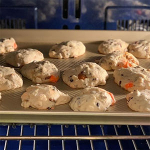 Images of cookies being baked on a pan