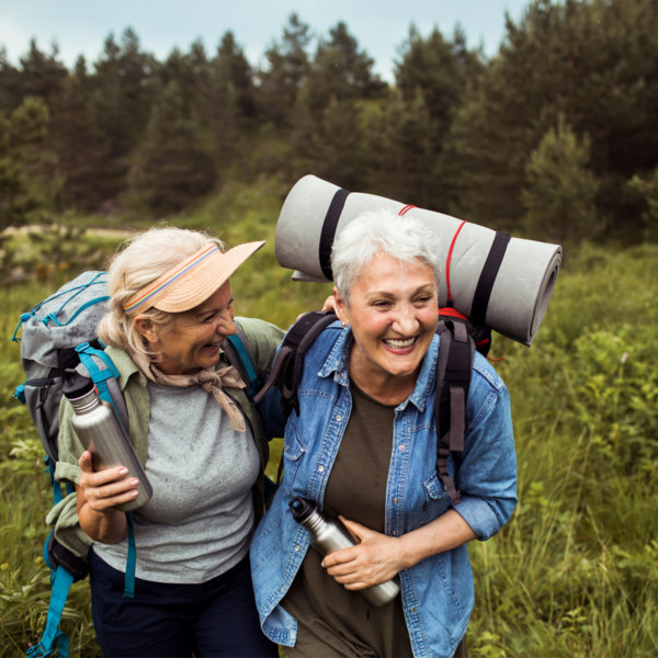 Older woman hiking through nature