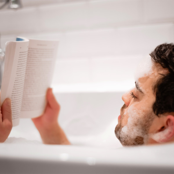 Image of someone reading a book.