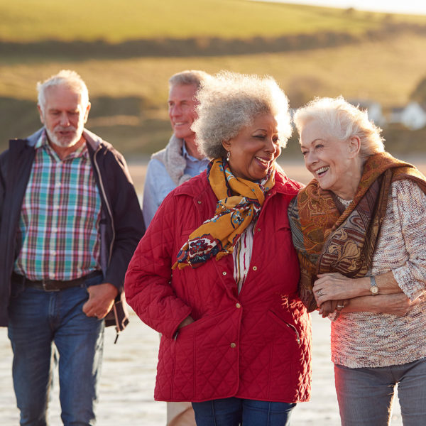 Image of a group of elderly friends together outside