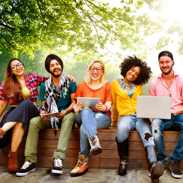 Image of a group of friends hanging out outside