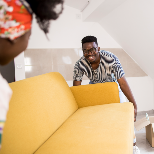 Man moving couch