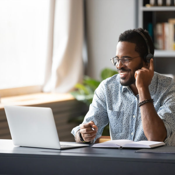 Man working from home in button up for zoom meeting