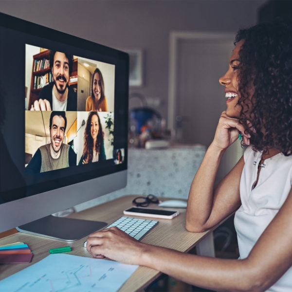 Woman wearing fashionable work from home clothing on zoom meeting